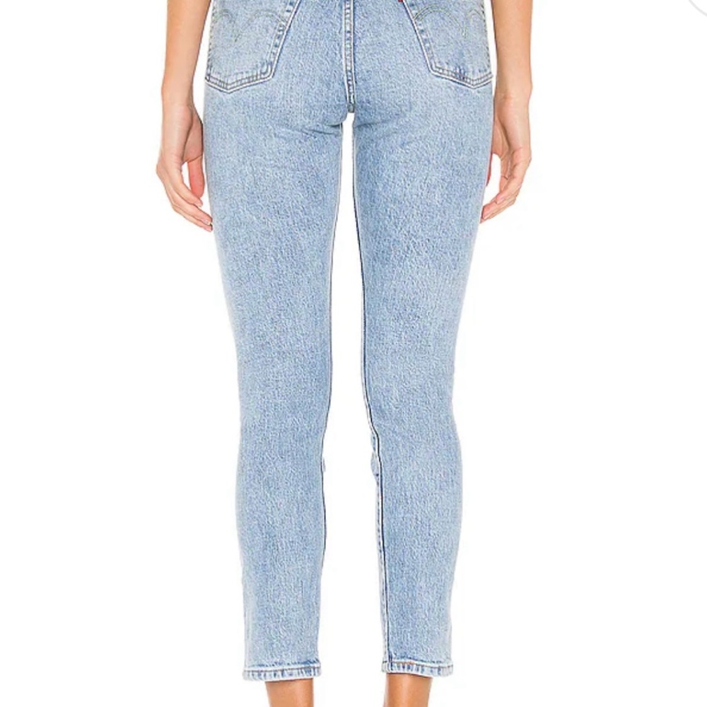 Levi’s 501 button fly skinny jeans.  Great condition